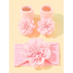 جوارب مانعة للانزلاق وربطة رأس بلون وردي الى 6 شهر