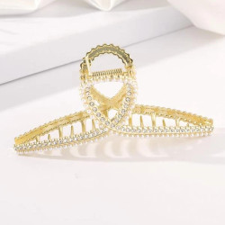 قباضة شعر مزينة بلول واحجار الراين 