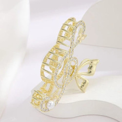 قباضة شعر بشكل نوته موسيقية مرصعة باحجار الراين واللؤلؤ الصناعي 