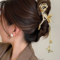 قباضة شعر بتصميم زهرة بلون ذهبي