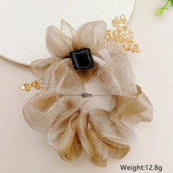 ربطة شعر ذهبية مزخرفة باللؤلؤ المركن