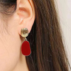 أقراط متدلية بتصميم جيو