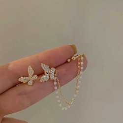 اقراط نسائية مزينة بحجر الراين وفراشة