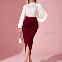 تنورة ثنية الحافية بلون موحد