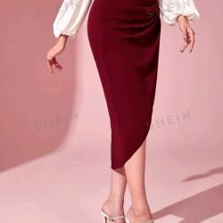 تنورة ثنية الحافية بلون موحد