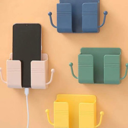 حامل جداري بلاصق للجوال والريموت بألوان عشوائية