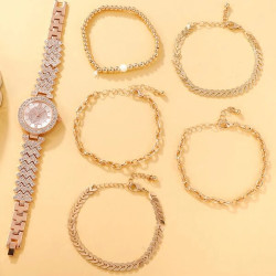 ساعة كوارتز بديكور حجر الراين دائري و 5 قطع اساور